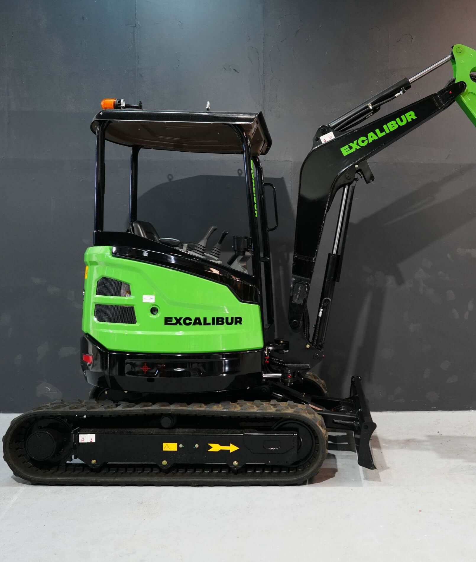 Excalibur 2.7 Tonne Excavator in green, showcasing heavy-duty design and compact build for construction work.