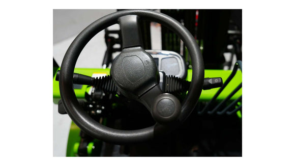 Close-up of the steering wheel of a 2.5 Tonne Diesel Forklift from Excalibur Machinery, showcasing ergonomic design.