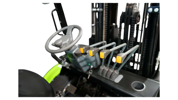 Interior view of a 3.5 Tonne 4WD Forklift showing steering wheel and control levers for precision operation.
