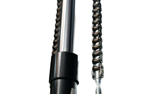 Close-up of electric pallet jack components, showcasing chain and hydraulic cylinder for efficient material handling.