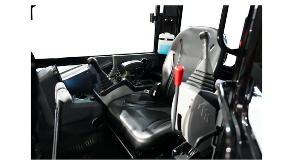 Interior view of the 3.8 Tonne Excavator operator's cabin showcasing the seat and control levers.