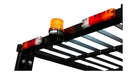 Safety light and reflectors on a heavy-duty equipment rack for enhanced visibility and safety.